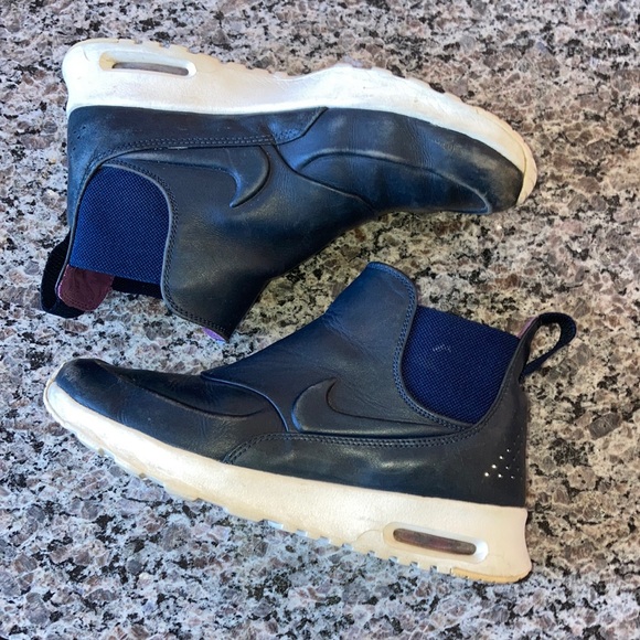 Nike Shoes - Women’s rain high top sneakers